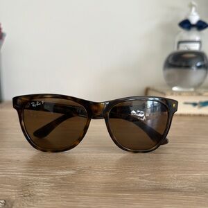Authentic Polarized Wayfarer Ray Ban Sunglasses with original leather case.
